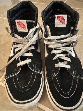 Vans Black and White High-Top Skate Sneakers